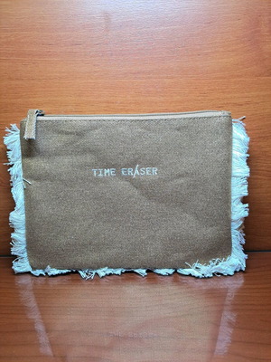 Time eraser toiletry bag new with brown zipper and gold weave