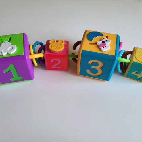 4 Hasbro Chain Cubes used, educational toy