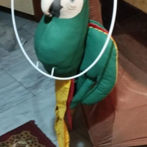 Large parrot doll used with metal hanging base