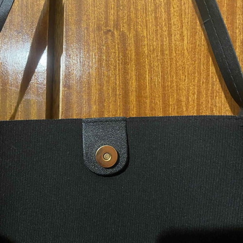 Black shoulder bag unused with space