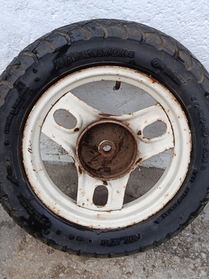 Honda Dio 50 rear rim used with Bridgestone tire