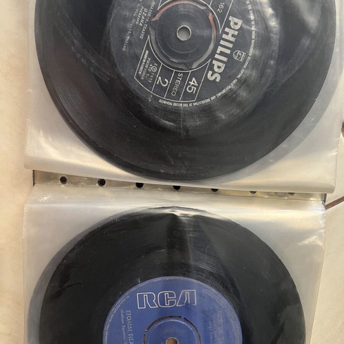 Vinyl 45 rpm records used, two cases with over fifty laiko and rembetika