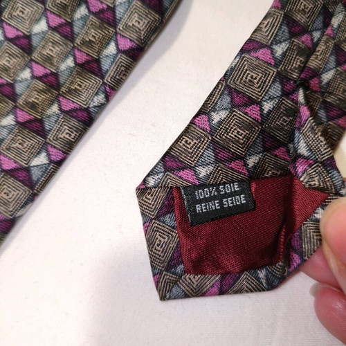 Vogue silk tie used with geometric pattern in brown and purple