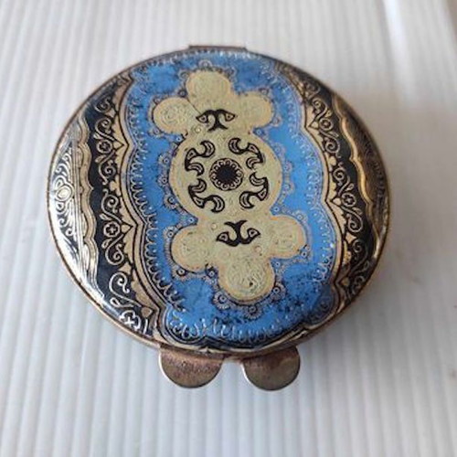Powder compact used Made Italy with metal case and soft cover
