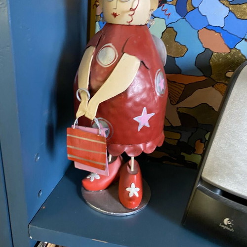 Decorative metal doll with spring like new