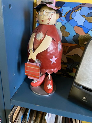 Decorative metal doll with spring like new