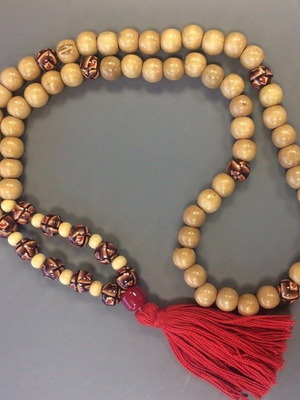 Handcrafted wooden mala with painted beads and red tassel like new