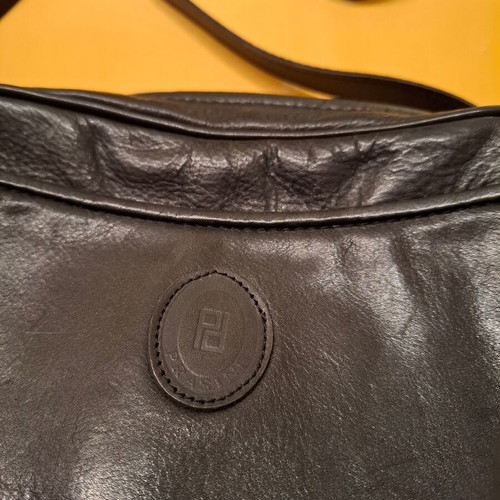 Shoulder bag black genuine leather like new with elephant detail