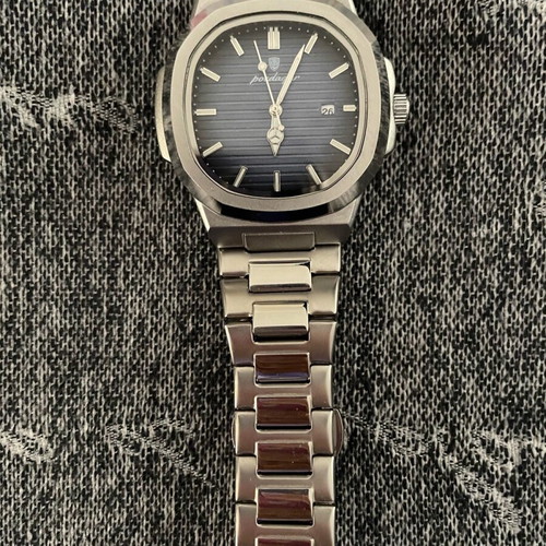 Men's watch metal bracelet like new, luminous and date display