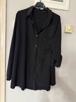 Black shirt one size like new with pocket and sleeve button