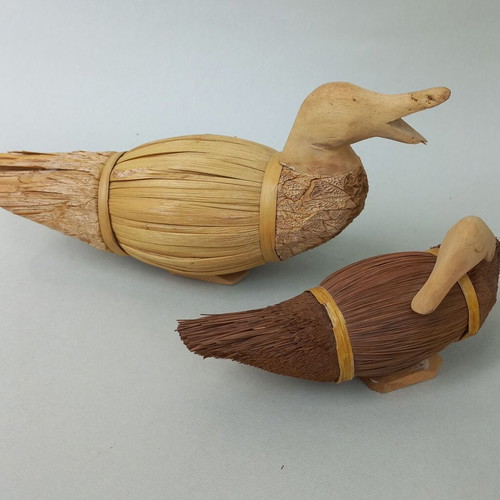 Set of handmade decorative wicker ducks used