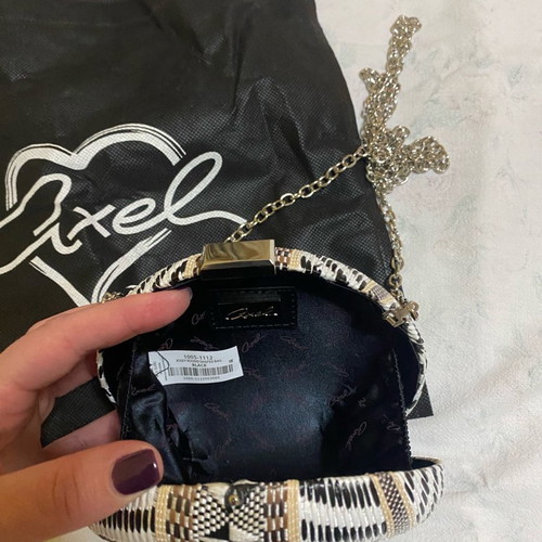 Axel clutch bag 14.5 cm like new, multicolor