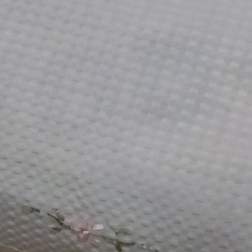 Embroidered tablecloth like new with satin ribbon and floral motifs