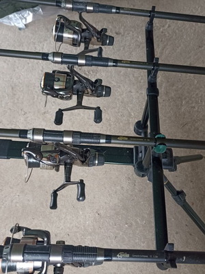 Carp fishing rods like new with full equipment and 4-person boat
