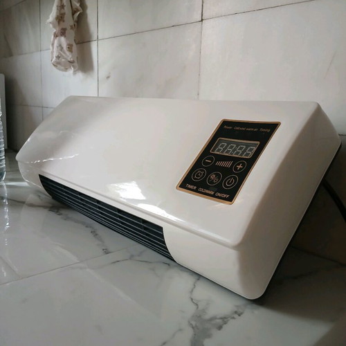 Wall-mounted 2000W heater with remote control, like new