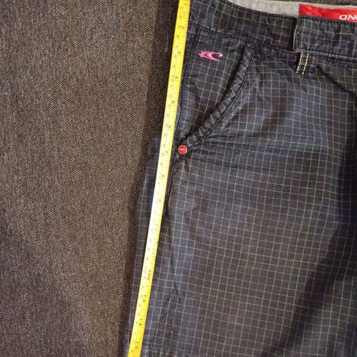 O'Neill women's shorts used, size 28, colorful checkered pattern
