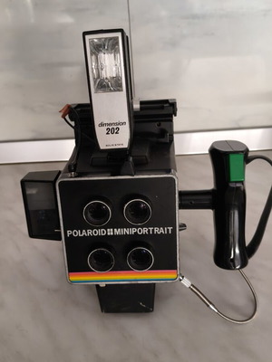 Polaroid Miniportrait Model 402 camera with Dimension 202 flash