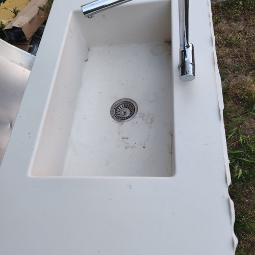 Corian sink with telescopic faucet like new