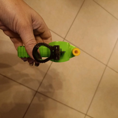 Small children's toy gun used with plastic darts