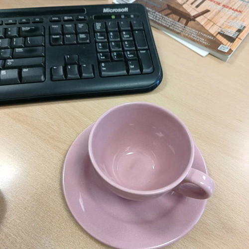 Pink coffee cup like new with saucer