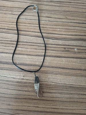 Necklace with cord and asymmetric metal motif like new