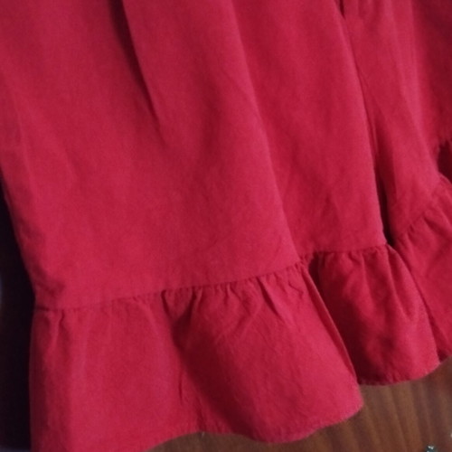 High-waisted women's red shorts like new with ruffles and pleats