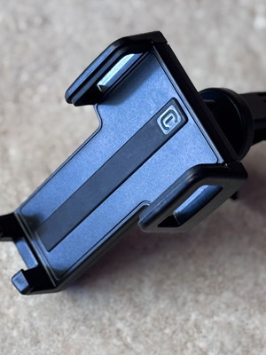 Car air vent phone holder used, universal black plastic