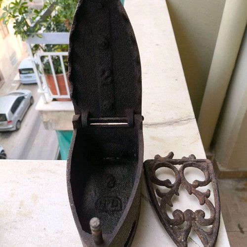 Antique iron used, late 19th century with base