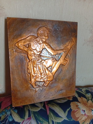 Copper embossed wall decor on wooden base, like new