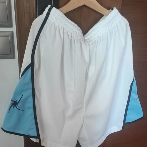 Zeus sportswear medium like new, white and turquoise