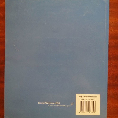 Essentials of Economics 3rd Bradley R. Schiller like new