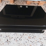 Optibase glass TV stand