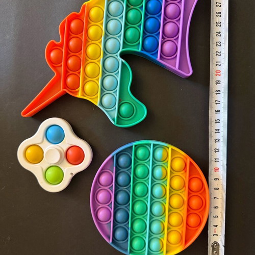 Set of 7 Pop It toys like new, includes multiplication learning