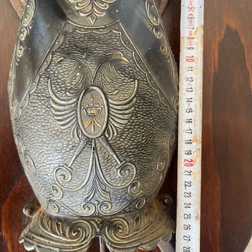Antique armor and swords used on wood