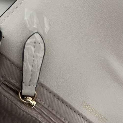 Nine West crossbody bag cream like new with case