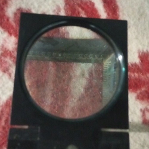 Magnifying glass 4 inch with stand like new