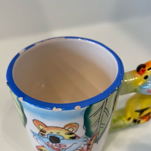 Tiger design mug used, small rim damages