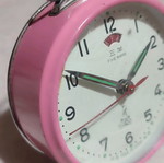 Five Rams table clock used, wind-up, pink