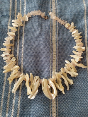 Necklace made of shells like new, sun-like design