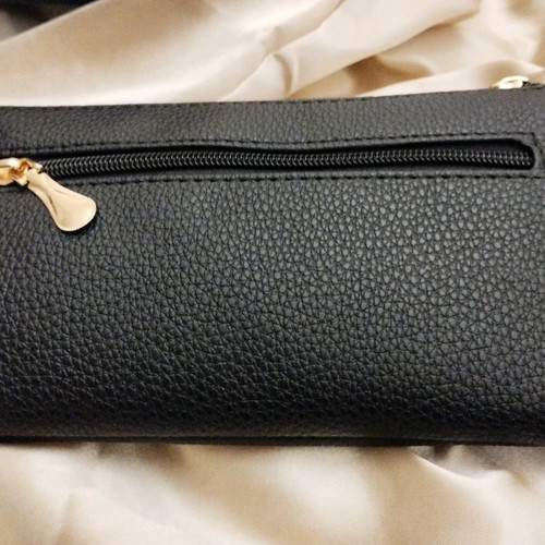 Small wallet bag for hand and shoulder suitable for travel