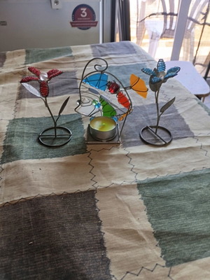 Set of three handmade decorative candle holder and flowers