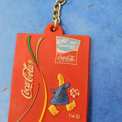 Coca-Cola Collectible Rubber Keychain Athens 2004 Olympics Phoebus mascot like new