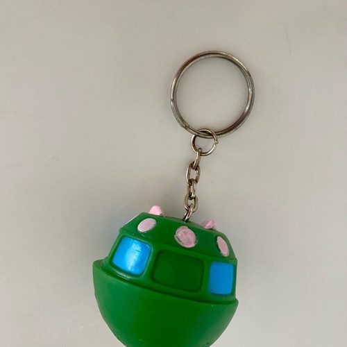 Vintage UFO keychain inflatable flying saucer like new, green