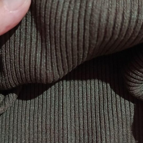 Khaki blouse S/M with batwing sleeves and decorative buttons