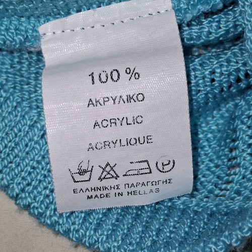 Turquoise knitted top with short sleeves like new
