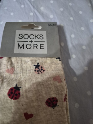 Socks new with ladybug and heart pattern