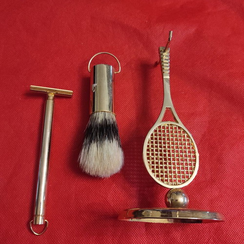 Vintage shaving set new gold-plated metal on tennis racket base