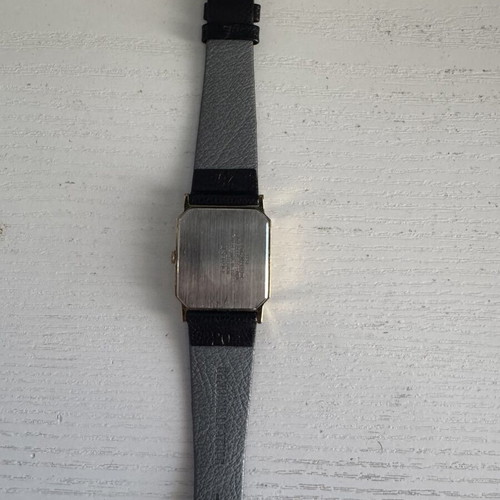 Orient VX Quartz watch, vintage gold rectangular case, brown leather strap