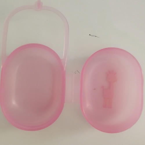 Plastic pacifier case used, pink with giraffe design