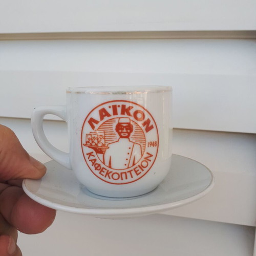 Cup and saucer used "LAIKON KAFEKOPTEION"